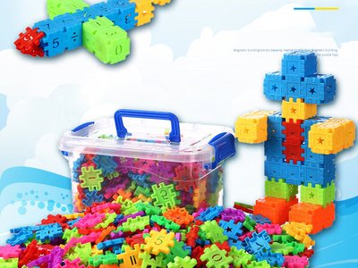 A robot and a house built out of the interlocking blocks